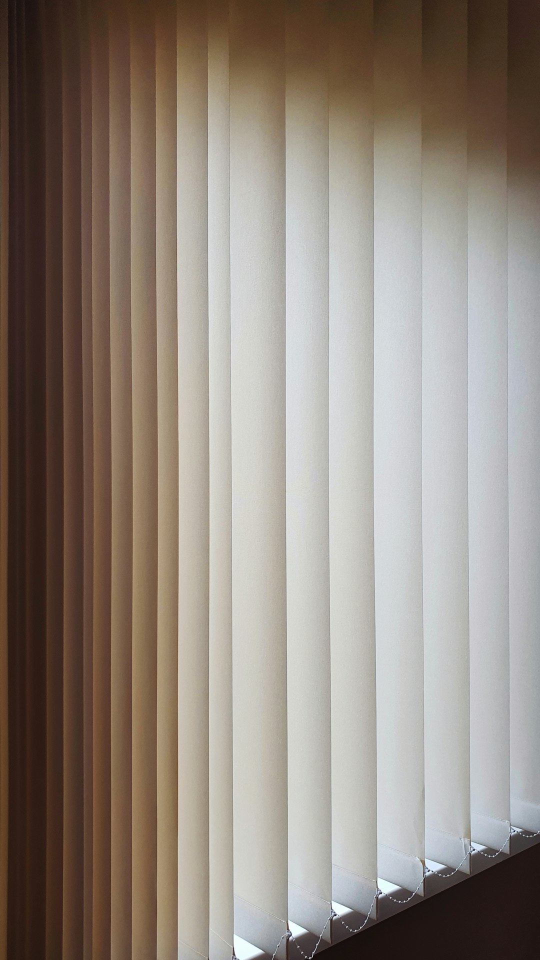 a-close-up-of-a-closed-window-with-blinds-yo-vxfh0rsi